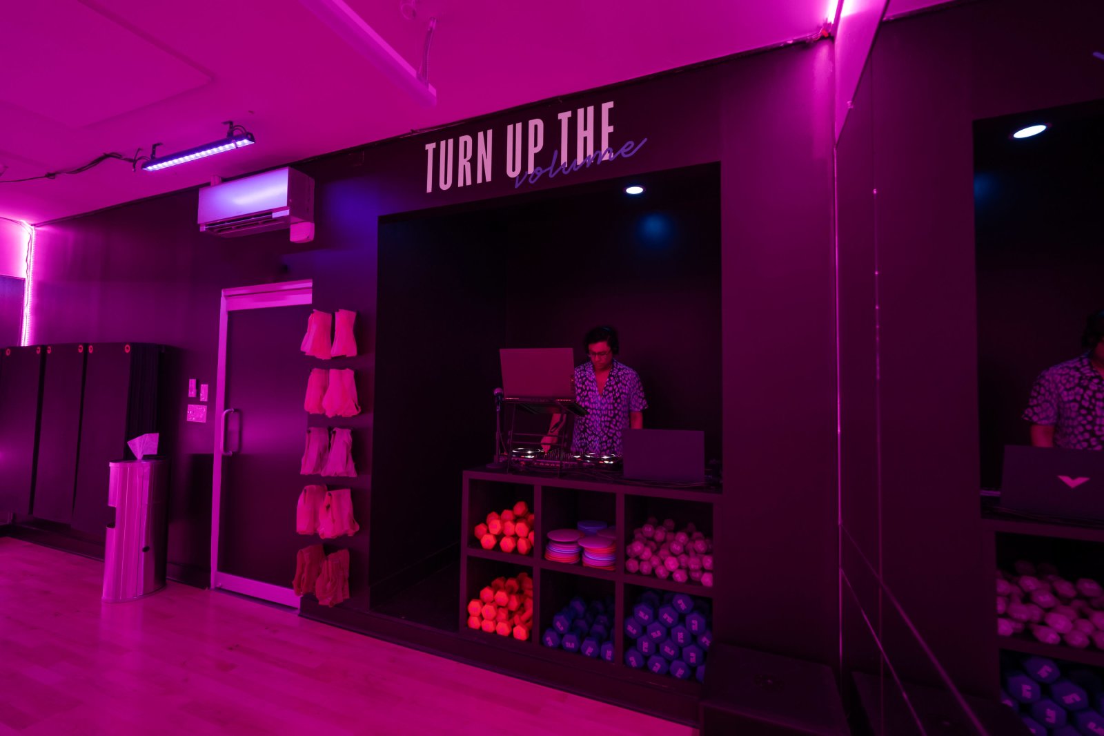 DJ booth with weights rack at 305 Fitness Philly