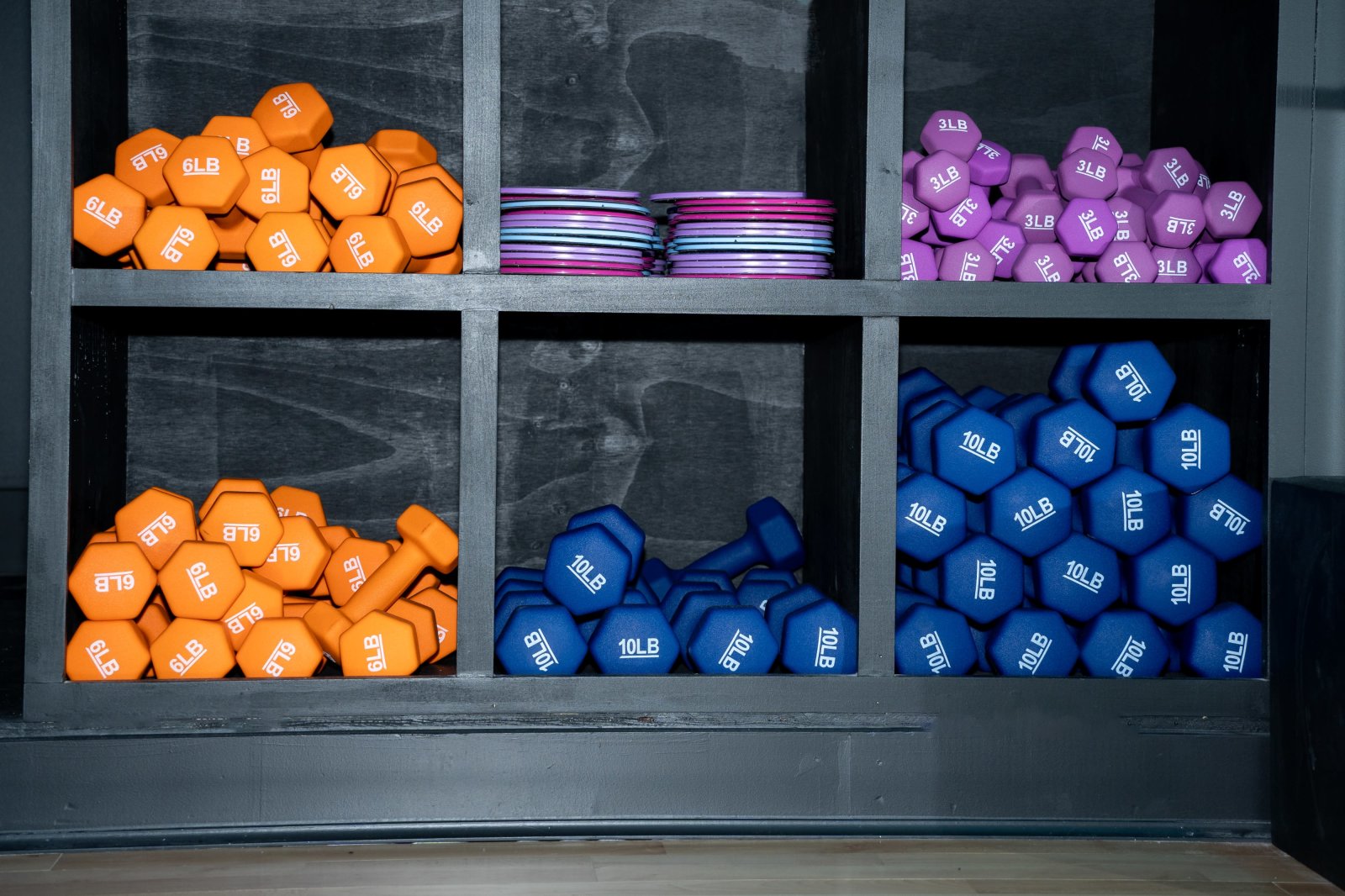 Colorful dumbbell rack at 305 Fitness Philly